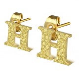 Clou pour oreille en acier lettre gold ip A