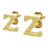 Clou pour oreille en acier lettre gold ip A
