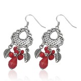 Boucles d'oreilles vintages 40 - Plumes et breloques rouges