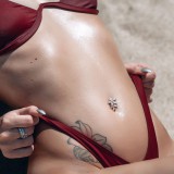 Piercing nombril inversé 25 - Fleur et pétales transparents