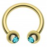 Piercing fer à cheval 24 - Plaqué-or jaune cristal bleu-clair