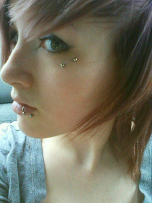  Piercing anti-arcade avec une barbell 