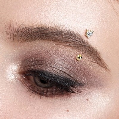  Piercing arcade gold-ip avec cristal