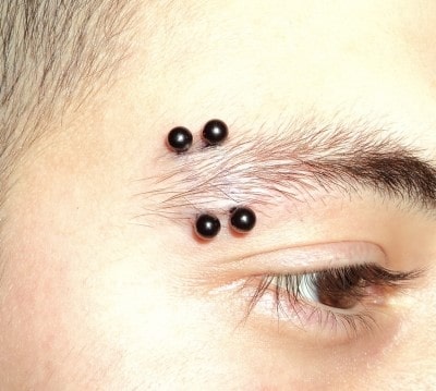  Double piercing arcade avec banane plaqué-titane noir 