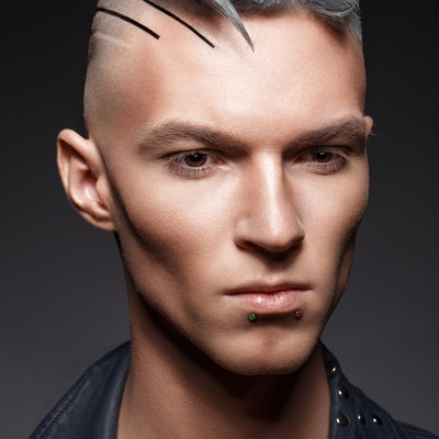 Piercing snake-bites avec des labrets logos œil psychédélique 